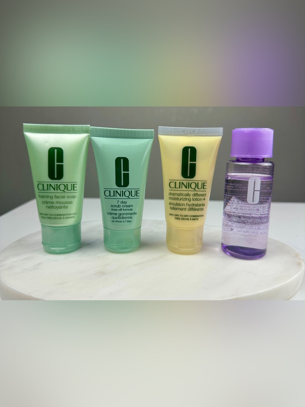 Clinique 4 Piece Travel Skincare Set Cleanser Scrub Lotion Makeup Remover NEW